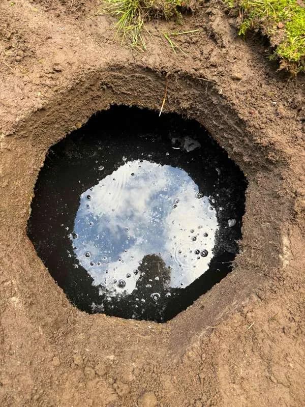 The second compartment opened up, the liquid surface reflecting the sky.
